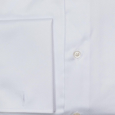 Close-up of the Hagen Dobby Tux Shirt MF12706100 sleeve cuff, showcasing two buttons and textured fabric—a refined cotton essential from Hagen for any formal wardrobe.