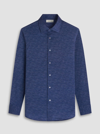 The Bugatchi James Long Sleeve Shirt HF9505K60 by Bugatchi features textured blue Italian fabric, a button-up front, collar, and cuffed sleeves—an essential for premium menswear enthusiasts. Displayed on a plain light background.