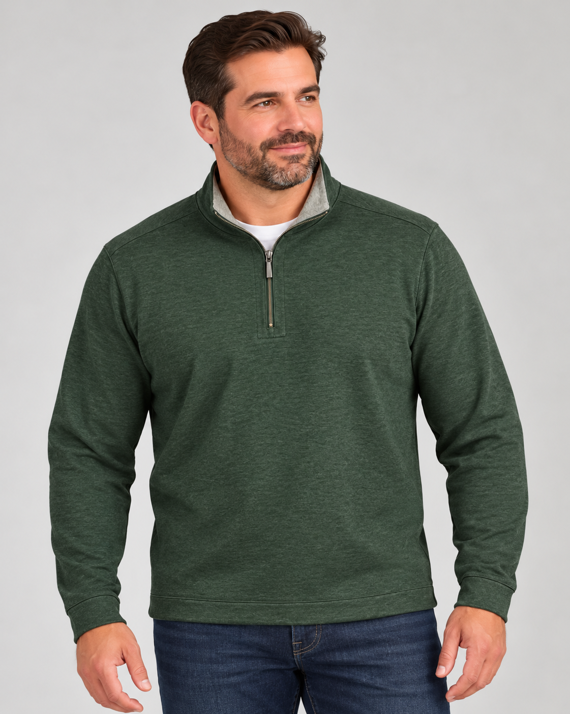 A man wearing a dark green Tommy Bahama Flipview 1/2 Zip Reversible Sweatshirt Big & Tall half-zip pullover with a grey inner collar.
