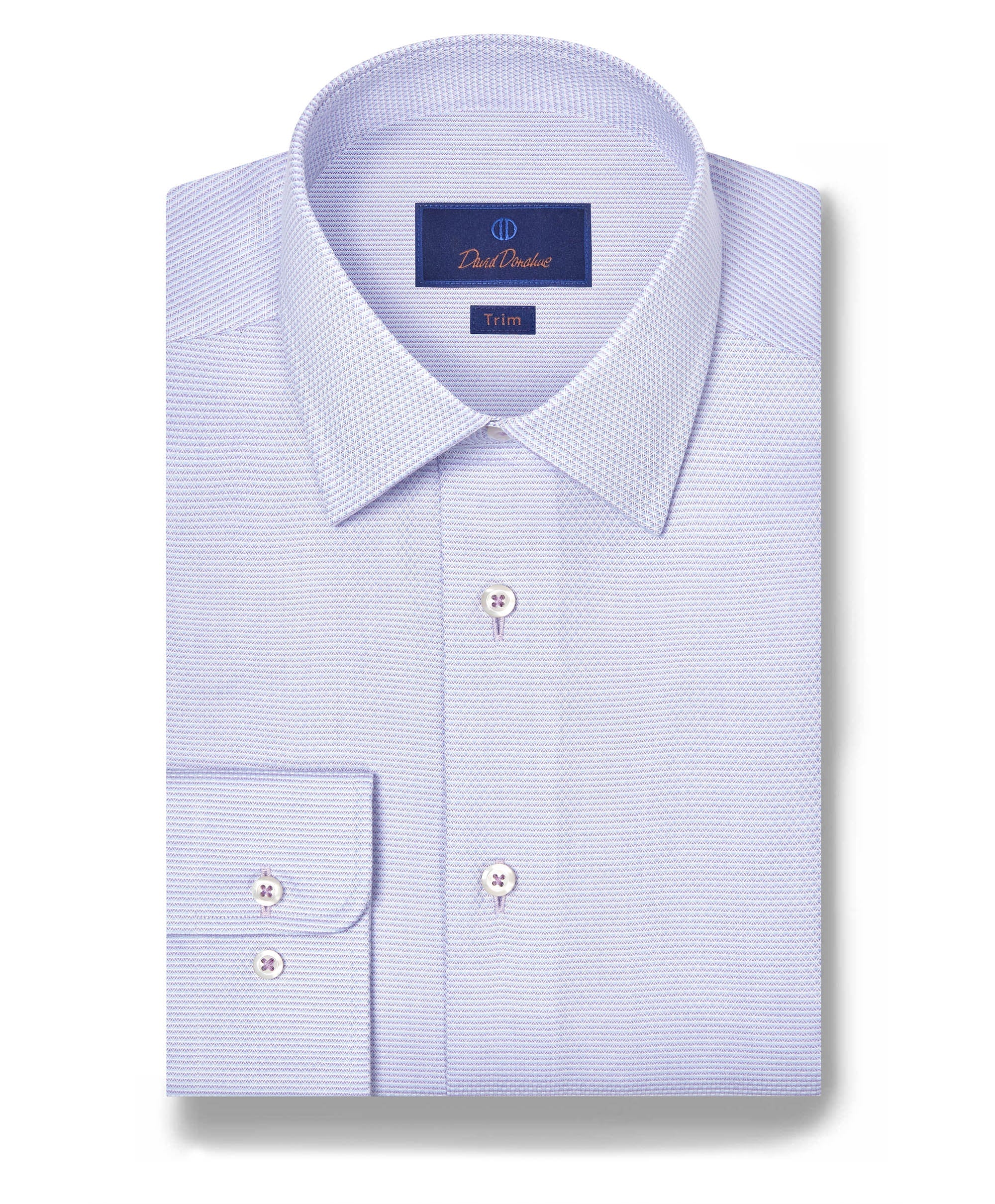 A folded lilac David Donahue OP Micro Dobby Dress Shirt with a pointed collar, white buttons, and a label displaying the brand and Trim fit.
