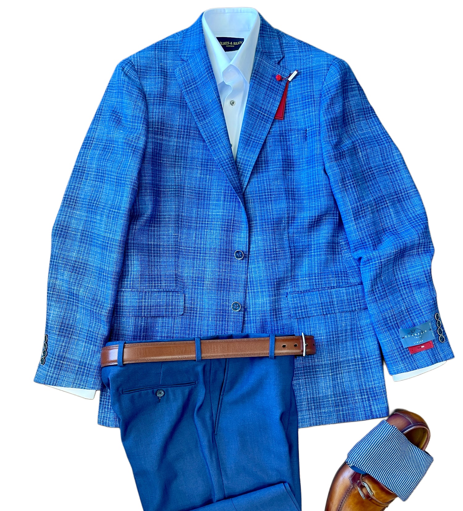 Pair the TailoRed Gianni Sport Coat 8130534 with a white dress shirt, blue trousers, brown leather belt, and brown loafers featuring striped blue-and-white fabric for a sharp look.