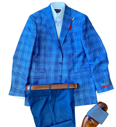 Pair the TailoRed Gianni Sport Coat 8130534 with a white dress shirt, blue trousers, brown leather belt, and brown loafers featuring striped blue-and-white fabric for a sharp look.