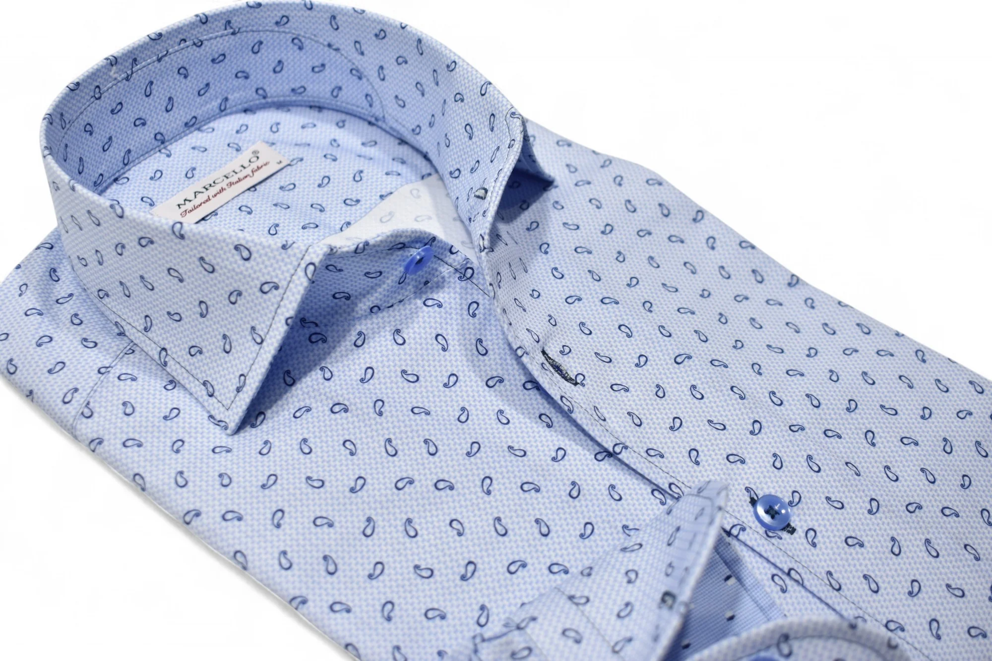 The Marcello Brickell Paisley Sport Shirt W123 by Marcello is a folded light blue cotton shirt featuring a small dark blue paisley pattern, blue buttons, and an elegant one-piece collar.