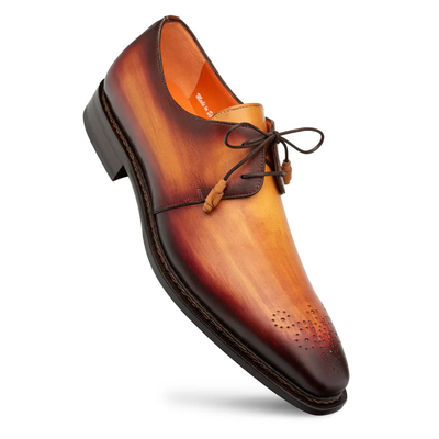 The Mezlan Principe Patina Leather Derby 20842 by Mezlan is a brown and tan Italian calfskin dress shoe with laces and decorative toe perforations, displayed from a side angle.