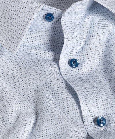 Close-up of the David Donahue Stretch Pima Dress Shirt TBSP13005 in light blue, showcasing its subtle dotted Oxford weave pattern, blue buttons, and open collar.