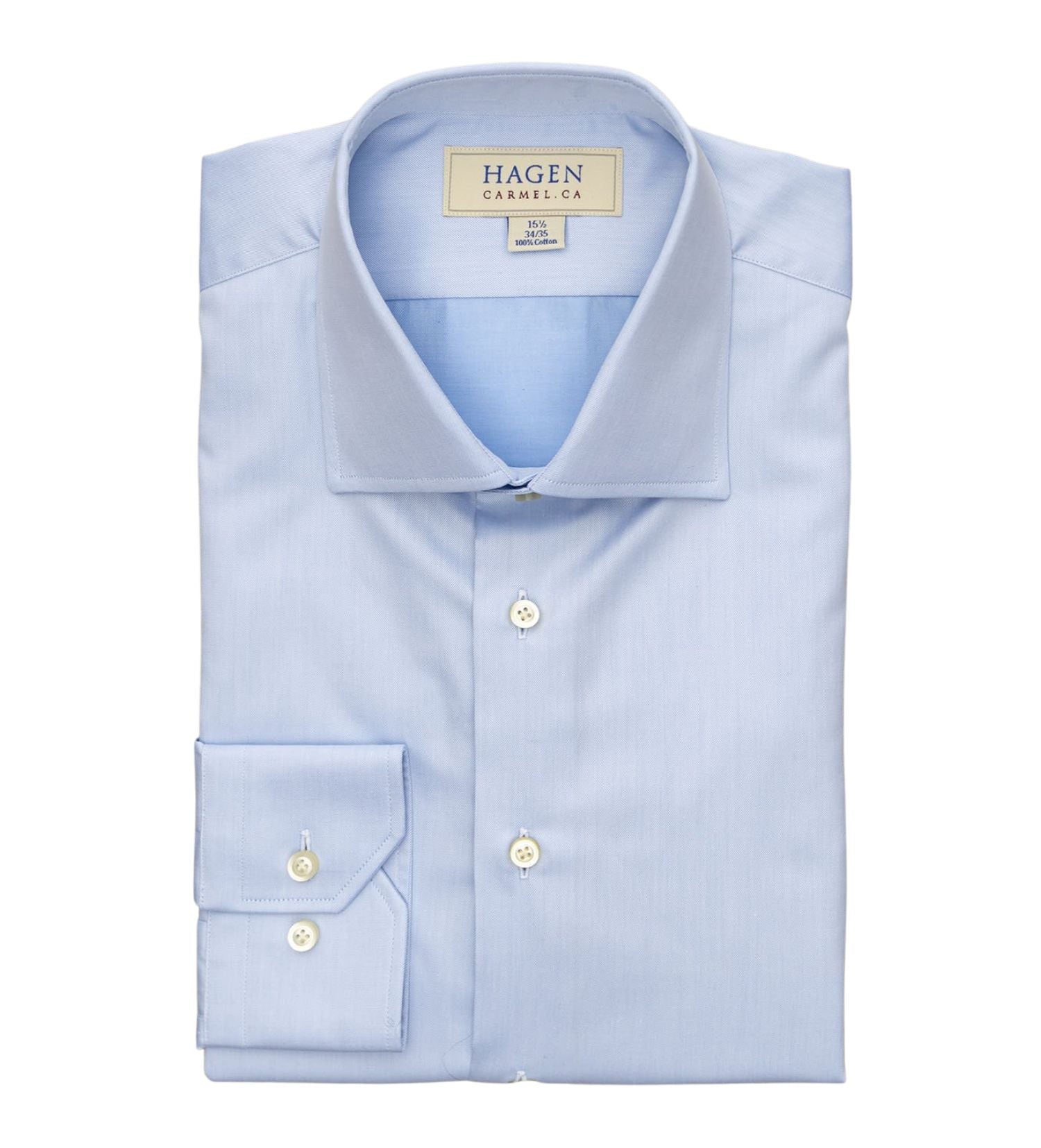 A neatly folded Hagen Solid Twill Shirt MB1864400 in light blue, crafted from superfine 100% cotton twill with white buttons and featuring a Hagen label on the inside collar.