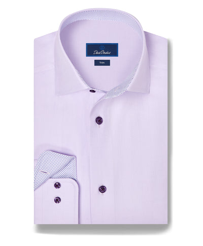 The David Donahue Contrast Herringbone Solid Dress Shirt TBMS13100 features light purple fabric, dark purple buttons, and a patterned inner cuff, neatly folded on a white background.