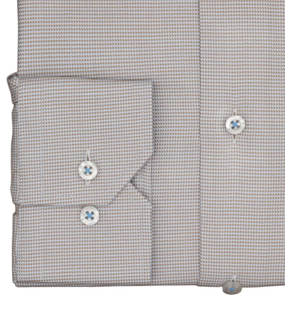 Close-up of the folded Hagen Micro Check Shirt MB5604232 by Hagen, featuring a refined small check pattern and crafted from premium cotton—ideal for enhancing your formal wardrobe. The image showcases the two-button cuff and part of the front placket with button detail.