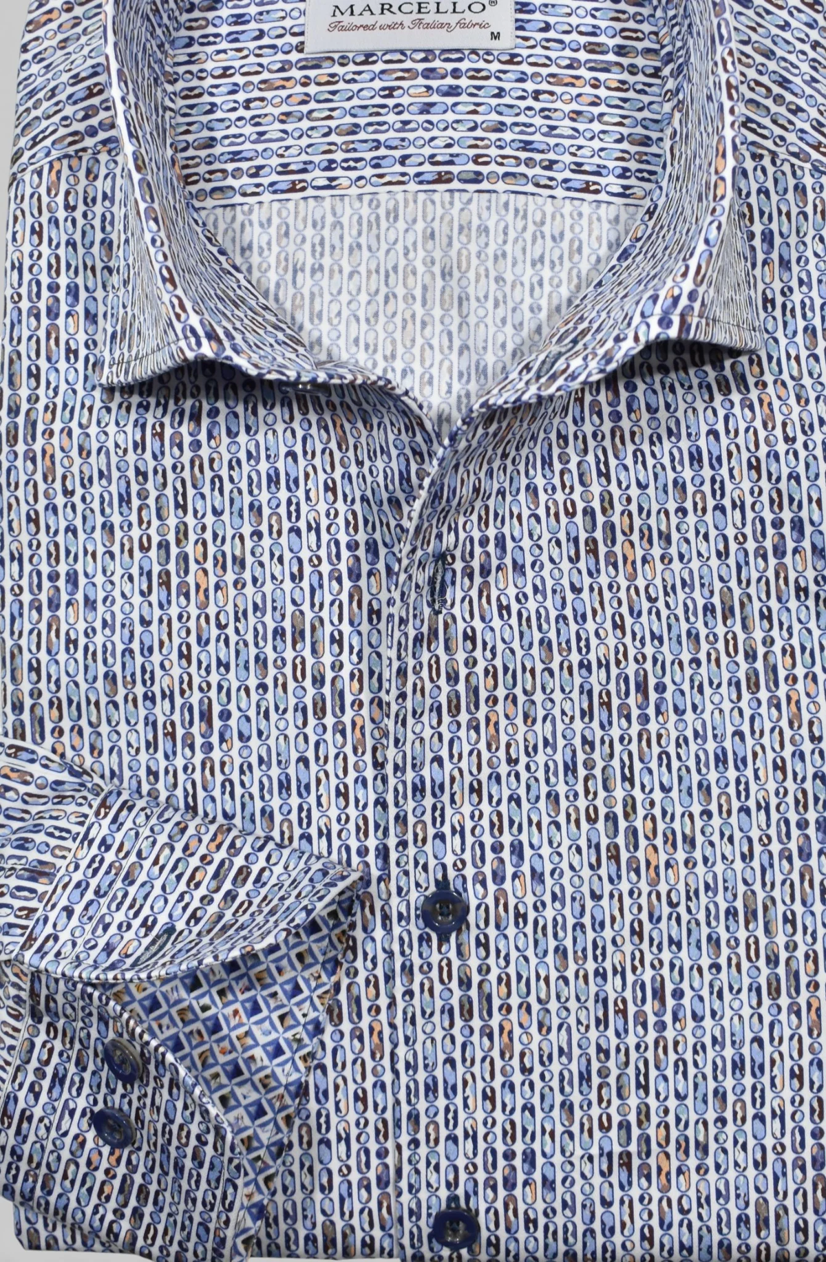 Marcello Dali Vertical Ovals Sport Shirt W228 featuring a repeating pattern of small blue and tan vertical ovals.