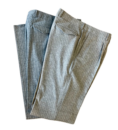 Two pairs of Ballin M5661 Soho Chalkstripe Trousers, one gray and one light brown, are folded side by side on a white background. Made by Ballin from breathable fabric, these trousers ensure all-day comfort.