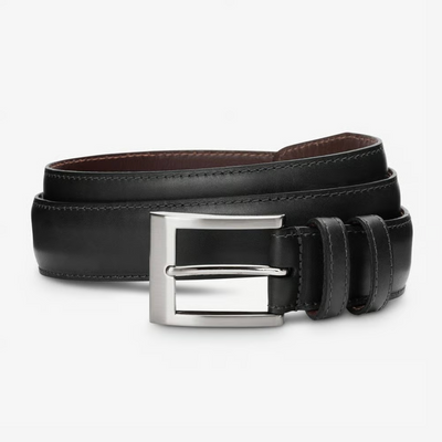 The Allen Edmonds Wide Basic Belt by Allen Edmonds is a black Italian calfskin leather dress belt with visible stitching, rolled up and featuring a rectangular silver buckle, handcrafted in America and displayed on a plain background.