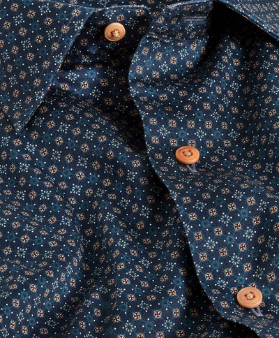 Close-up of the David Donahue Micro Print Sport Shirt CBSM11209, featuring a trim fit in navy with a micro geometric pattern and light brown buttons.